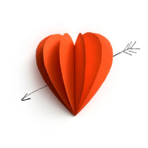 Paper book heart with amour arrow — Stock Photo, Image