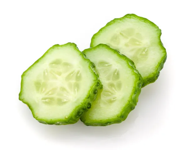 Cucumbers slices isolated on white background — Stock Photo, Image