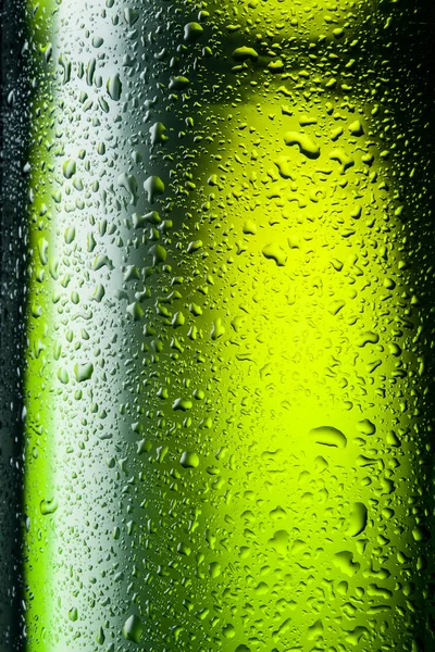 Green bottle with drops. Abstract background — Stock Photo, Image