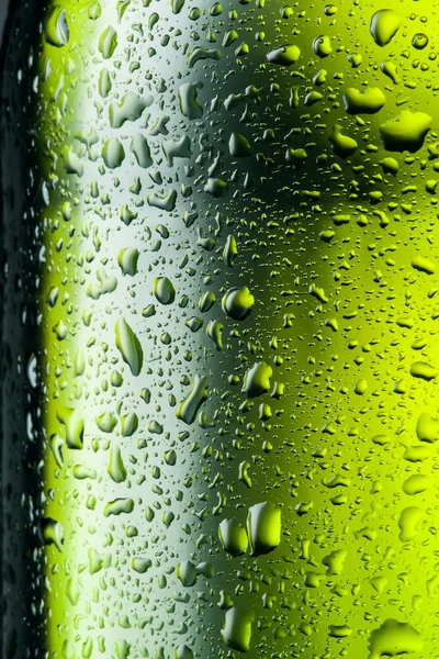 Gotas de agua textura en la botella verde. Fondo abstracto — Foto de Stock