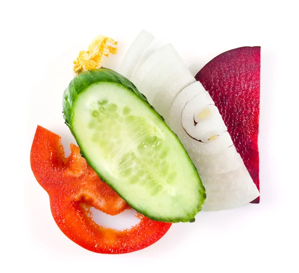 Légumes tranchés isolés sur blanc — Photo