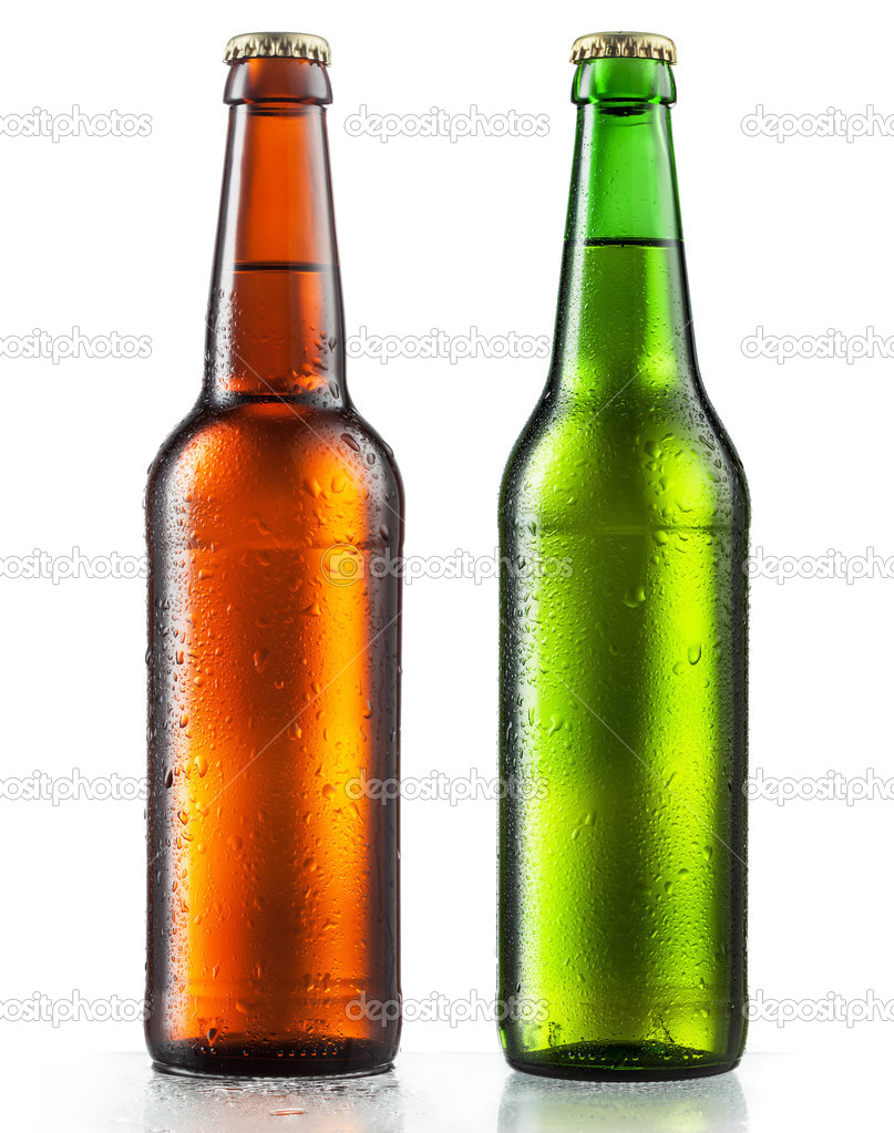 Bottles of beer with water drops on white background