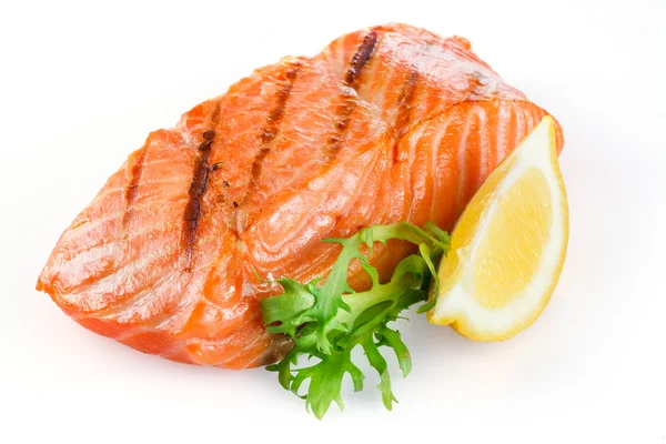 Grilled salmon with lemon isolated on white — Stock Photo, Image