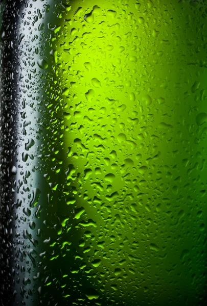 L'eau goutte de la texture sur la bouteille de bière. Contexte abstrait w — Photo