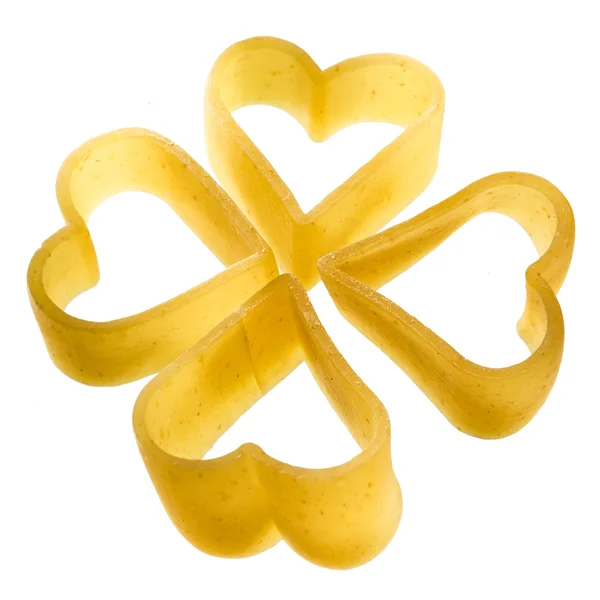 Pasta. uncooked red heart on white background — Stock Photo, Image