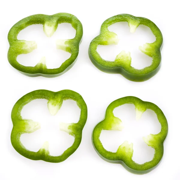 Sliced green pepper isolated on white, set — Stock Photo, Image