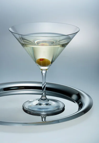 Glass of martini with olive — Stock Photo, Image