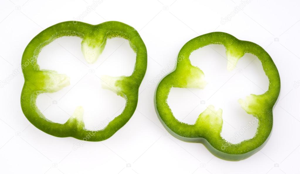 Sliced green pepper isolated on white Stock Photo by ©utima 40847919