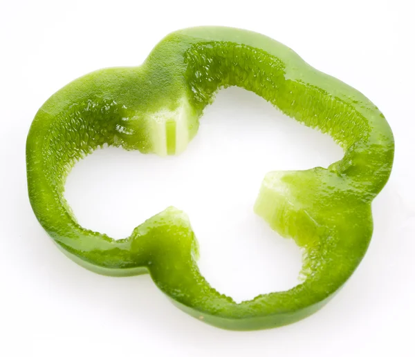 Slice of green bell pepper isolated on white — Stock Photo, Image