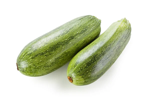 Due zucchine verdi fresche isolate su fondo bianco — Foto Stock