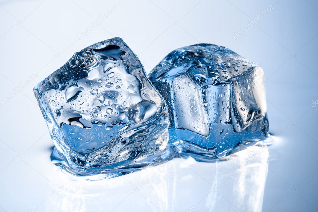 Ice cubes with drops isolated