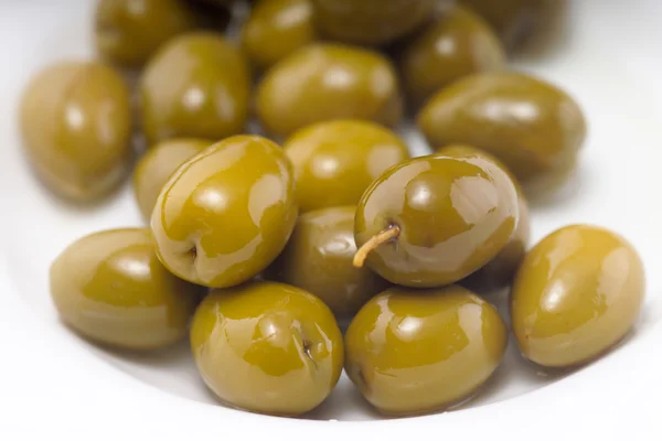 Green olives on white Stock Picture