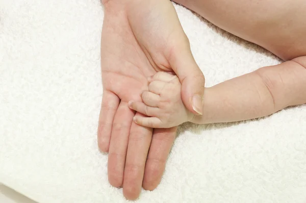 Baby touch — Stockfoto