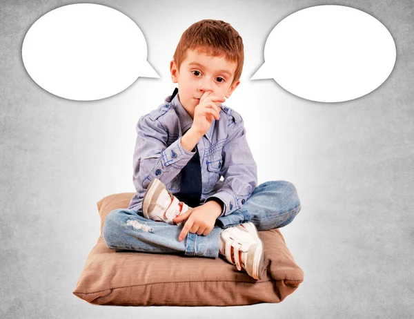 The boy on the pillow — Stock Photo, Image