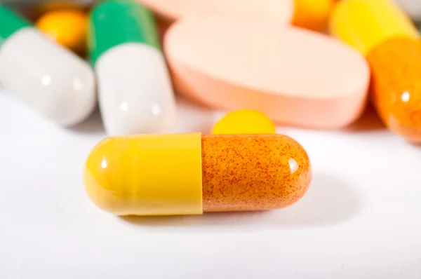 Yellow pill Royalty Free Stock Images