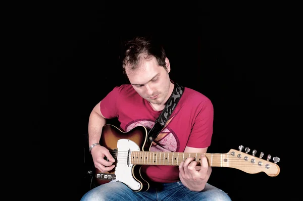 Homem tocando guitarra — Fotografia de Stock