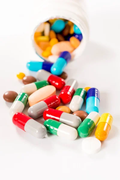 Pílulas salpicadas — Fotografia de Stock