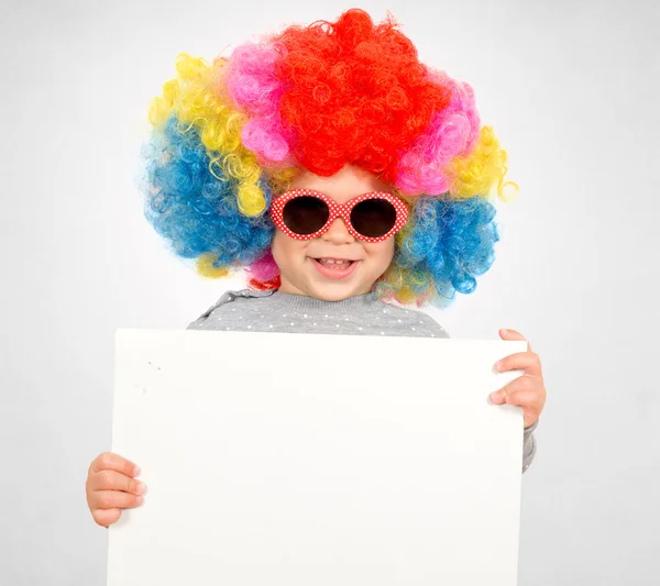 Clown child with blank paper — Stock Photo, Image