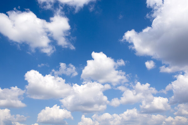 White clouds over blue sky