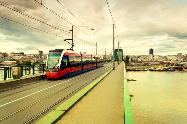 Tram on the bridge — Stock Photo, Image