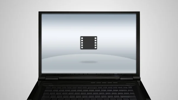 Exibição de monitor de laptop com ícone de filme — Fotografia de Stock