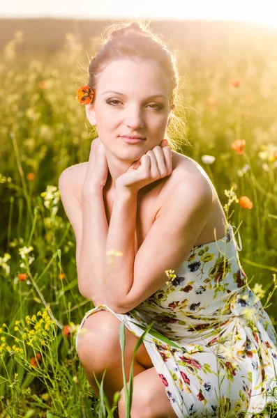 Young Woman poppy field at sunset — Stock Photo, Image