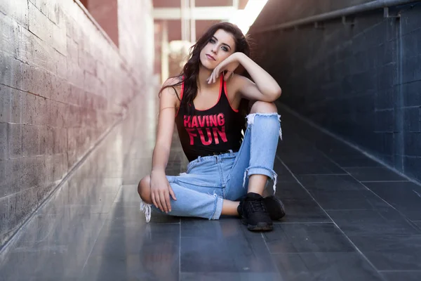 Young Brunette Girl Sitting Fashionable Pose Street — Photo