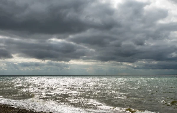 Dark gloomy day on a Uk beach — Stock Photo, Image