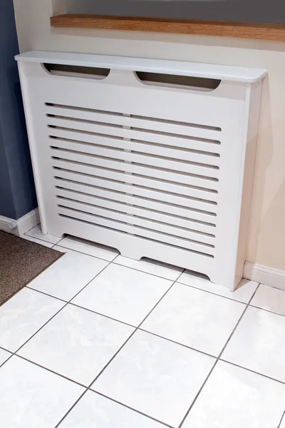 Radiator cabinet cover in a modern kitchen — Stock Photo, Image