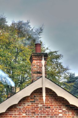 chimney smoke coming from an old fashioned house clipart