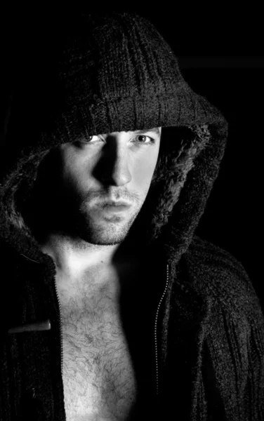 Angry violent man with hood up staring — Stock Photo, Image