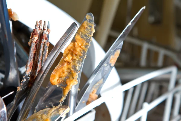 Inside of as dishwasher containing dirty dishes — Stock Photo, Image