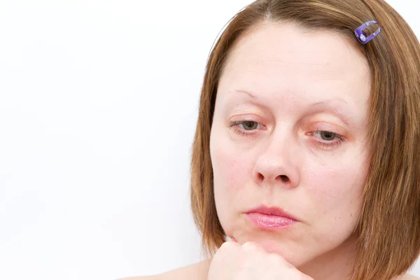 Depressieve vrouw naar beneden te kijken Stockfoto