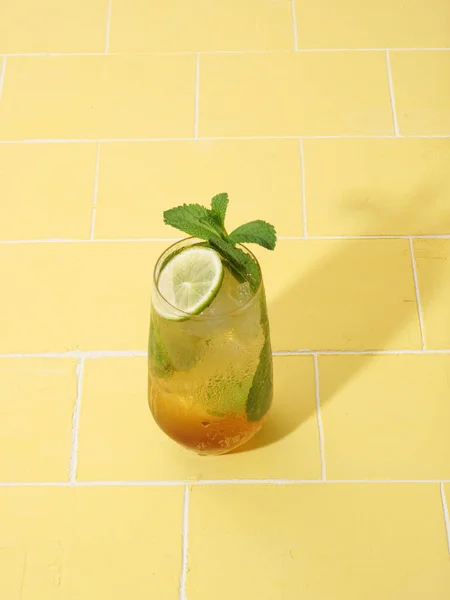 Mojito or virgin mojito long rum drink with fresh mint, lime juice, cane sugar and soda.