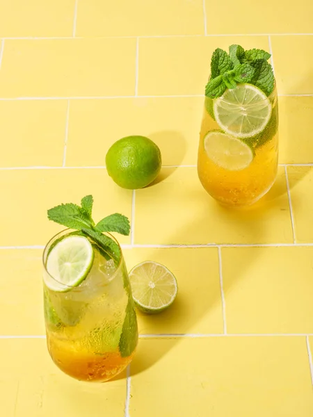 Mojito or virgin mojito long rum drink with fresh mint, lime juice, cane sugar and soda.