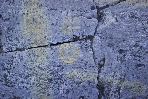 Una textura de piedra agrietada gris . —  Fotos de Stock