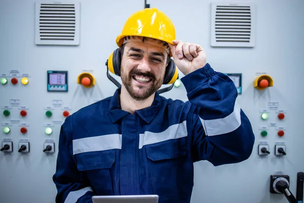 Portrait of smiling electric engineer.