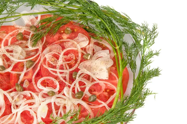Rodajas de tomates y cebollas en un plato —  Fotos de Stock