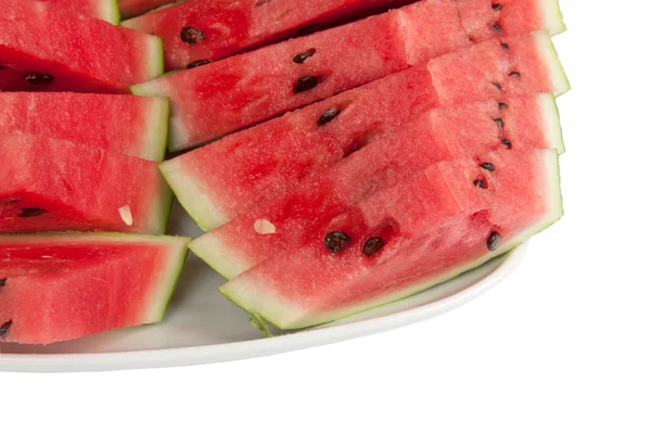 Sliced ​​watermelon on a large plate Stock Picture