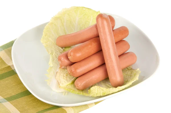 Fresh sausages on a plate — Stock Photo, Image
