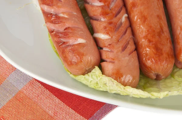 Grilled sausages on a plate — Stock Photo, Image