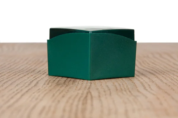 Large green box on the table — Stock Photo, Image