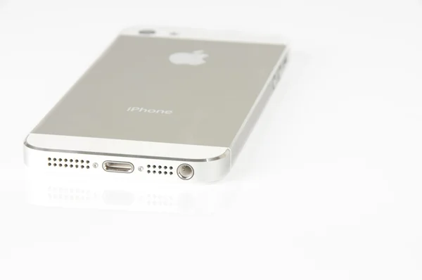 Close-up witte telefoon op een witte achtergrond — Stockfoto