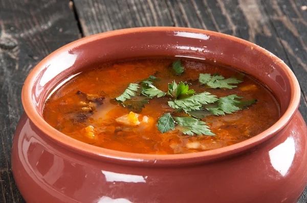 Bean soup and parsley on the table — Stock Photo, Image