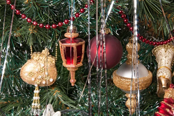 Christmas-tree decorations on a christmas fur-tree — Stock Photo, Image