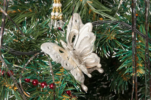 Christmas-tree decorations on a christmas fur-tree — Stock Photo, Image