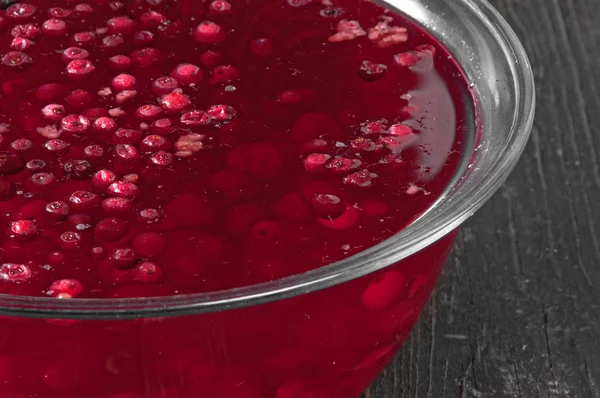 Stewed cranberries and other berries in a large glass bowl — Stock Photo, Image