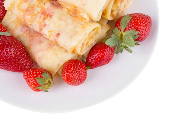 Pancakes with cherry jam and strawberries — Stock Photo, Image