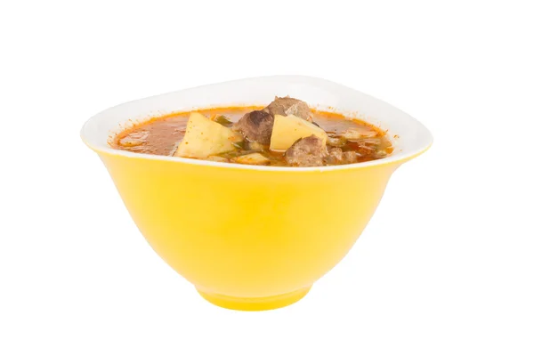 Goulash soep in een gele kom — Stockfoto
