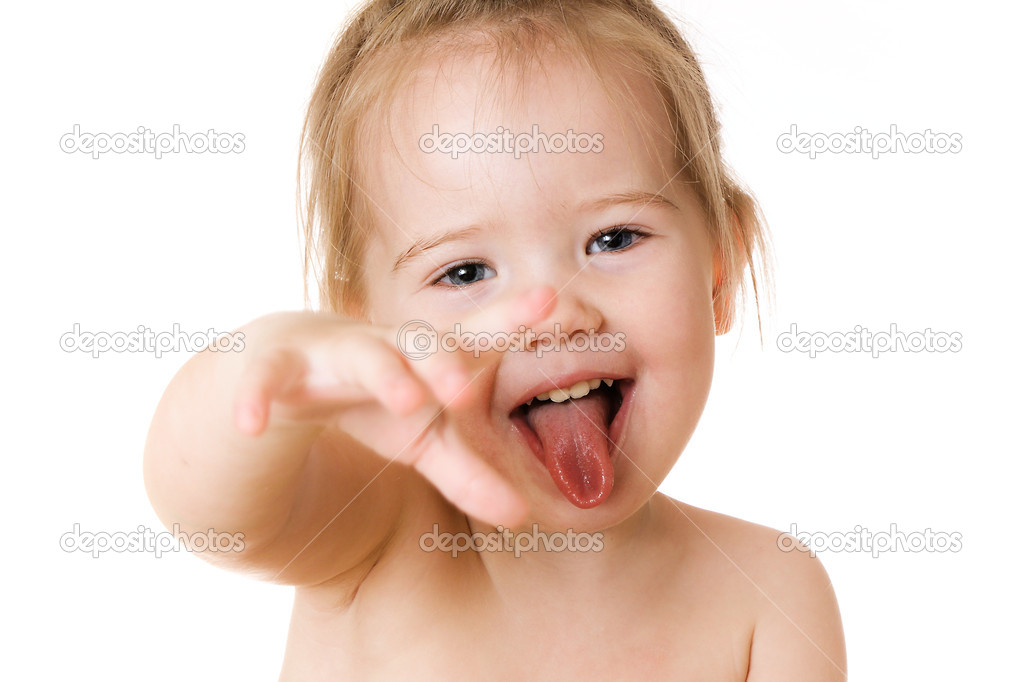 Girl shows tongue white background